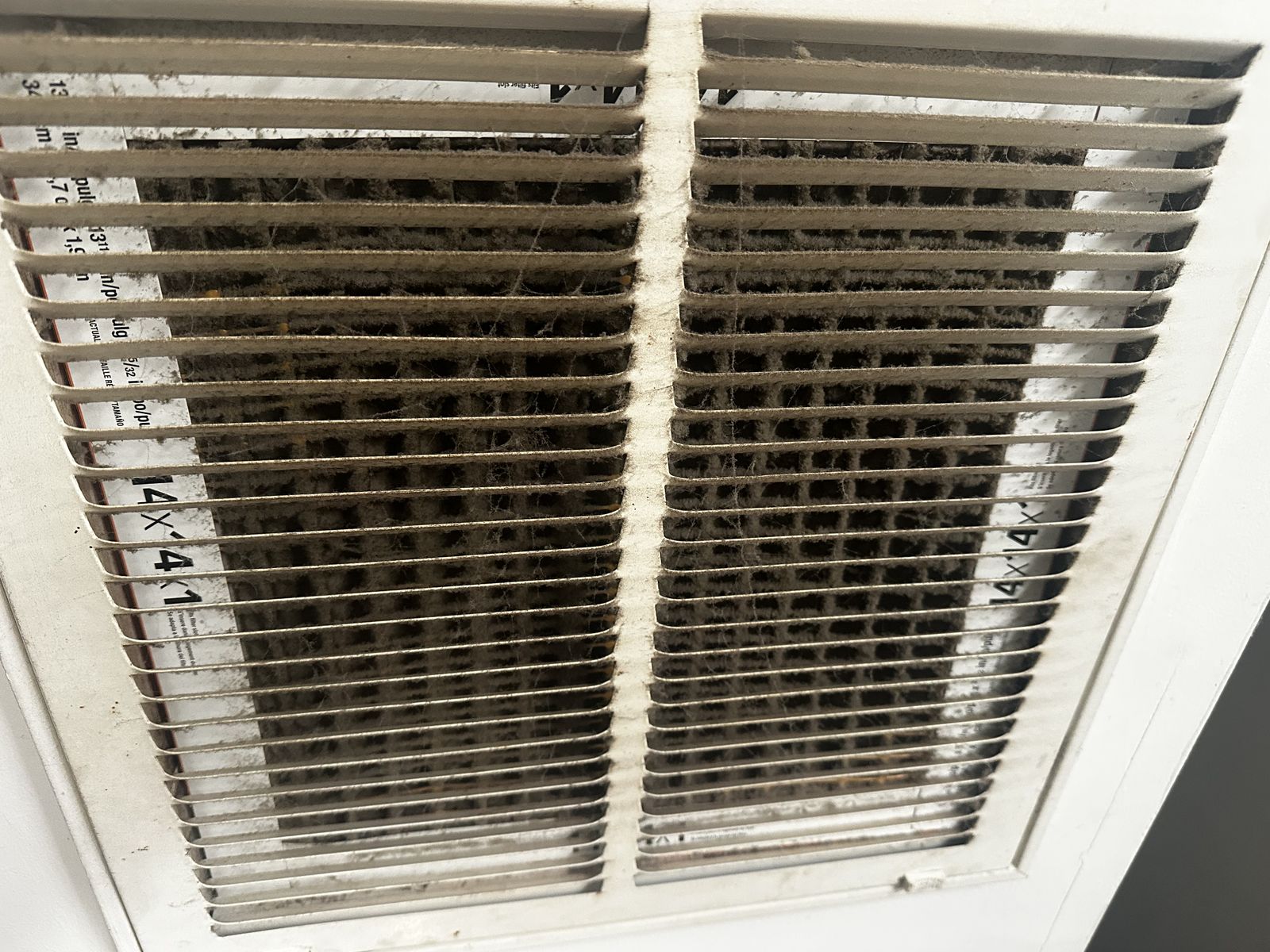 A dust-clogged HVAC filter affecting indoor air quality