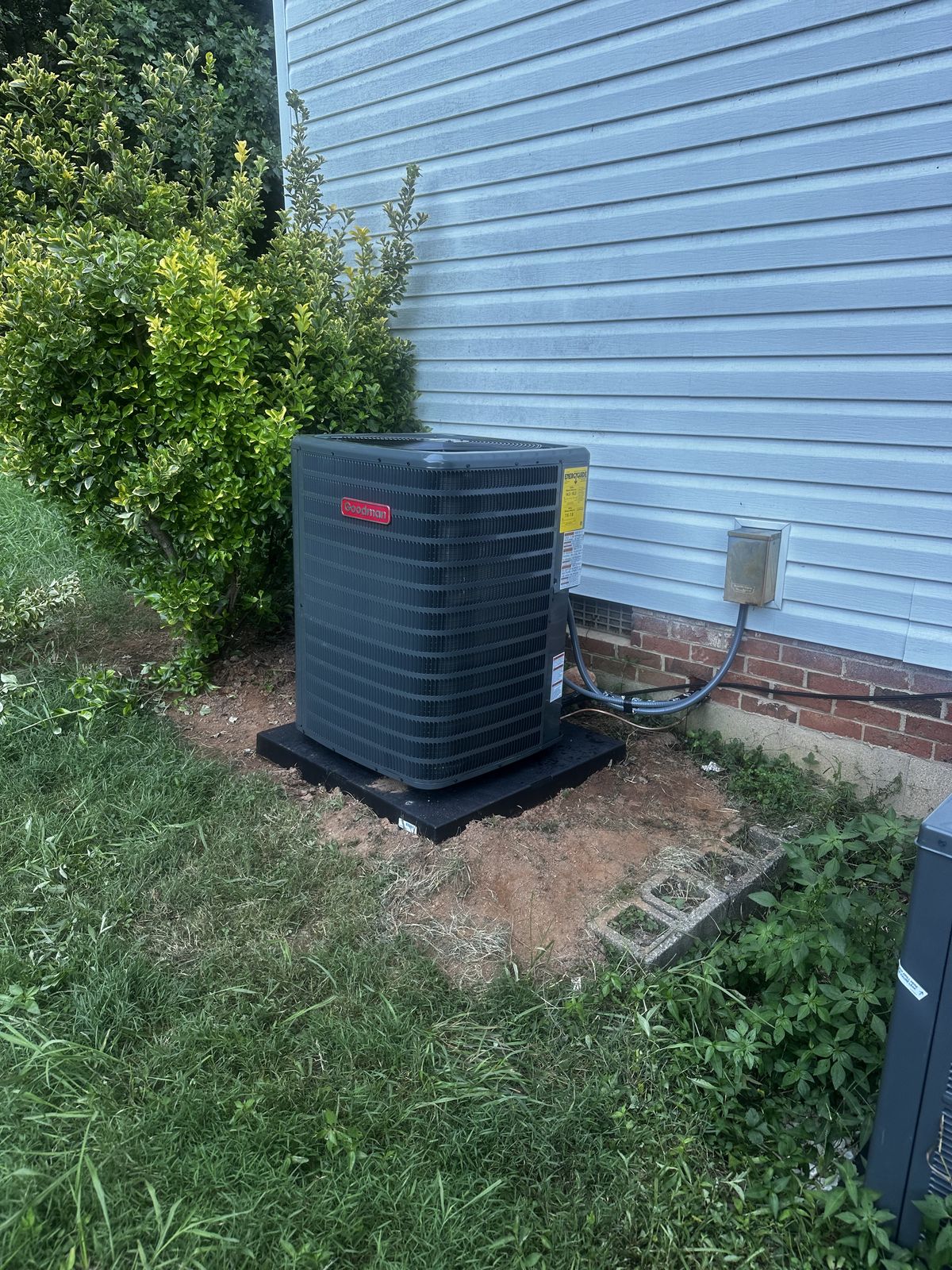 A newly installed high-efficiency outdoor heat pump system